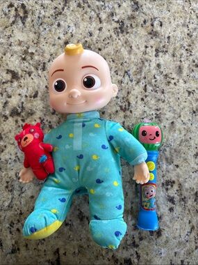 Cocomelon Doll and microphone